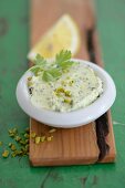 Lemon butter with herbs and pistachios