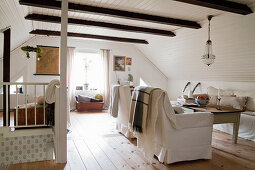 Attic living room in Scandinavian country-house style