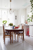 Antique wooden table in Scandinavian country-house kitchen