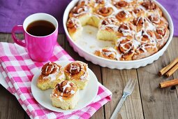 Cinnamon rolls served with tea