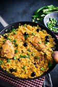 Saffron rice with chicken, peas and fava beans (Spain)