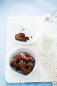 Heart shaped chocolate biscuits and milk