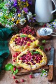 Pies with cream cheese filling and raspberries