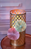 Pink and green paper rosettes on gold, Oriental lantern