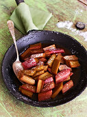 Rhubarb being steamed in orange juice