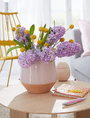 Vase of hyacinths and craspedia