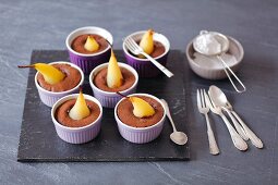Chocolate cakes with poached pear