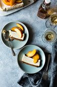 Gluten-free cheesecake with peaches in elderflower syrup