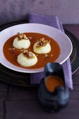Rosehip and seabuckthorn soup with walnut and semolina dumplings