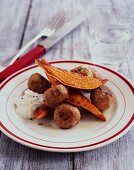 Meatballs with sweet potato wedges and dip