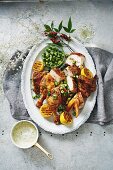 Barbecued zaatar chicken and lemon with tahini sauce