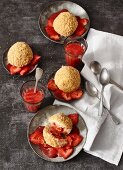 Strawberry dumplings with strawberry purée and sliced strawberries