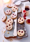 Schlawiner (jam biscuits with smiley faces)