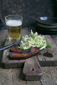 Fried bacon with pointed cabbage slaw
