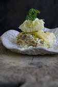 Pointed cabbage lasagne with bacon, caraway and pointed cabbage slaw