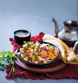 Dosas with chickpeas, pumpkin and red onion (Morocco)