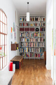 Floor-to-ceiling bookcases in period apartment