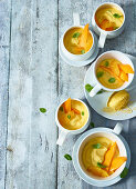 Orange and mango dessert in cups