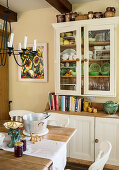 Two-part dresser and dining table in rustic kitchen