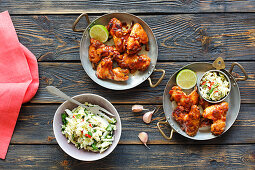 Chicken wings in honey and mustard marinade served with a Chinese cabbage salad