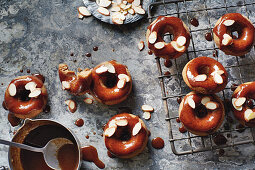 Gluten-free mini doughnuts with cinnamon glaze and flaked almonds