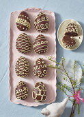 Homemade chocolate Easter eggs filled with biscuits