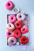 Pink and red-glazed doughnuts
