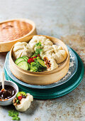 Steamed pork dumplings with Hoisin sauce