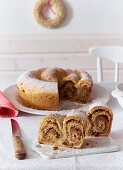 Kärntner Reindling (rolled yeast dough cake filled with sugar, cinnamon, raisins and butter from Austria)