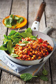 Spanish style roasted chickpeas with chorizo and baby spinach