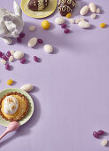 Various Easter sweets and a coconut tartlet