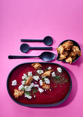Beetroot and potato soup with fennel, goat's cheese and croutons