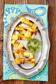 Grilled pineapple skewers with lime syrup