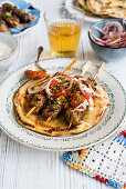 Giaortlou kebab (lamb kebab, Greece) on flatbread