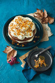 Pumpkin cake with cream cheese frosting and pecan nut brittle