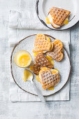 Coconut waffles with lemon curd and meringue