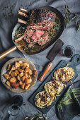 Roast beef with fried potatoes and white cabbage steaks