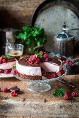 Chocolate cake with raspberry mousse, and a slice removed