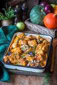Roasted chicken breast with pumpkin, apple and onion