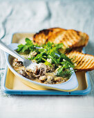 Oven-baked mushrooms with blue cheese and toasted bread