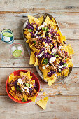 Pulled pork, cabbage and caramelised pineapple nachos