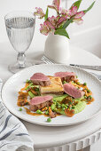 Lamb cannon, dauphinoise potatoes, peas, girolles, lamb and mint jus