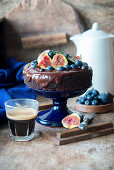Chocolate cake with figs and blueberries