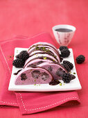 Blackberry and yoghurt parfait with pistachio nuts