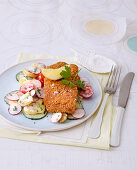 Baked cod with a cucumber and radish salad