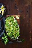 Butter braised celery with preserved lemon dressing