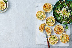 Asparagus and brie tarts with a spinach salad
