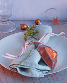 Festive place setting with napkin