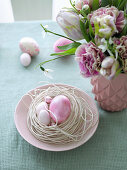Easter nest and vase of flowers