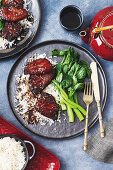 Sweet-soy braised pork ribs with choy sum (Asia)